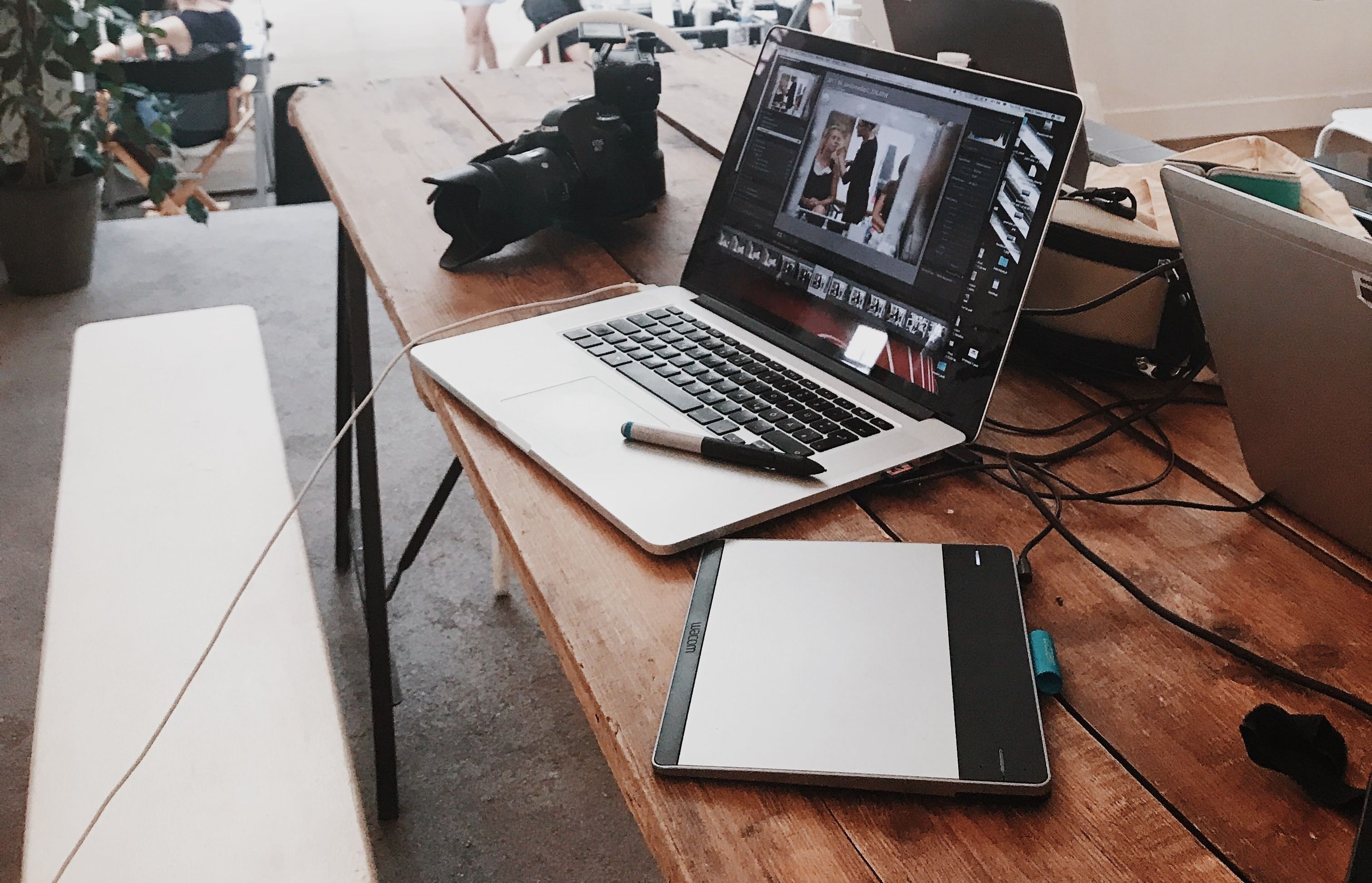 turned-on-gray-laptop-computer-on-table-699459