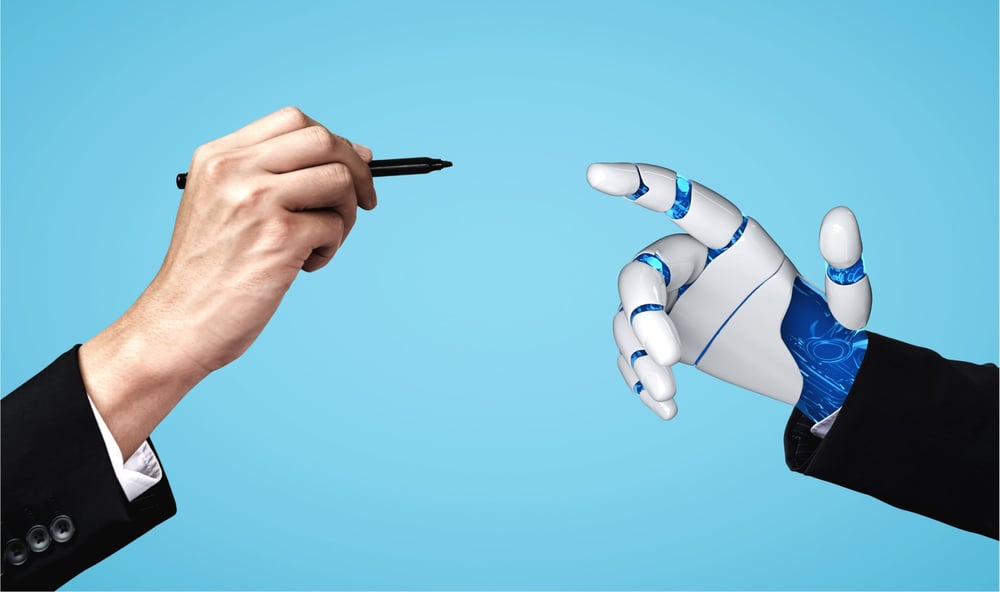 ai-hand-with-pen-connecting -to-ai-hand