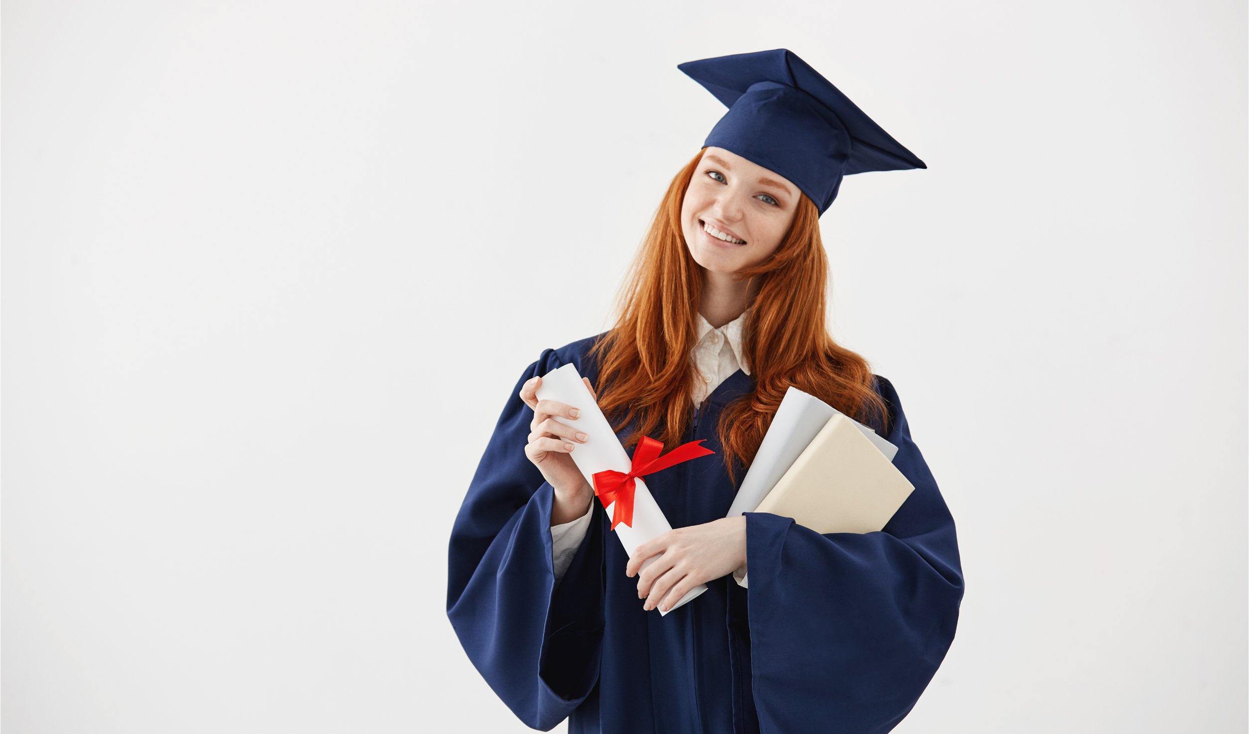 beautiful-redhead-female-graduate-smiling-holding-books-diploma_BLOG