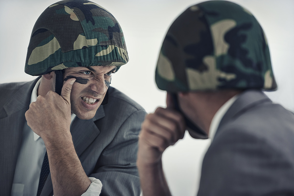 getting-ready-upcoming-battle-young-man-applying-camouflage-paint-his-face-botkeeper