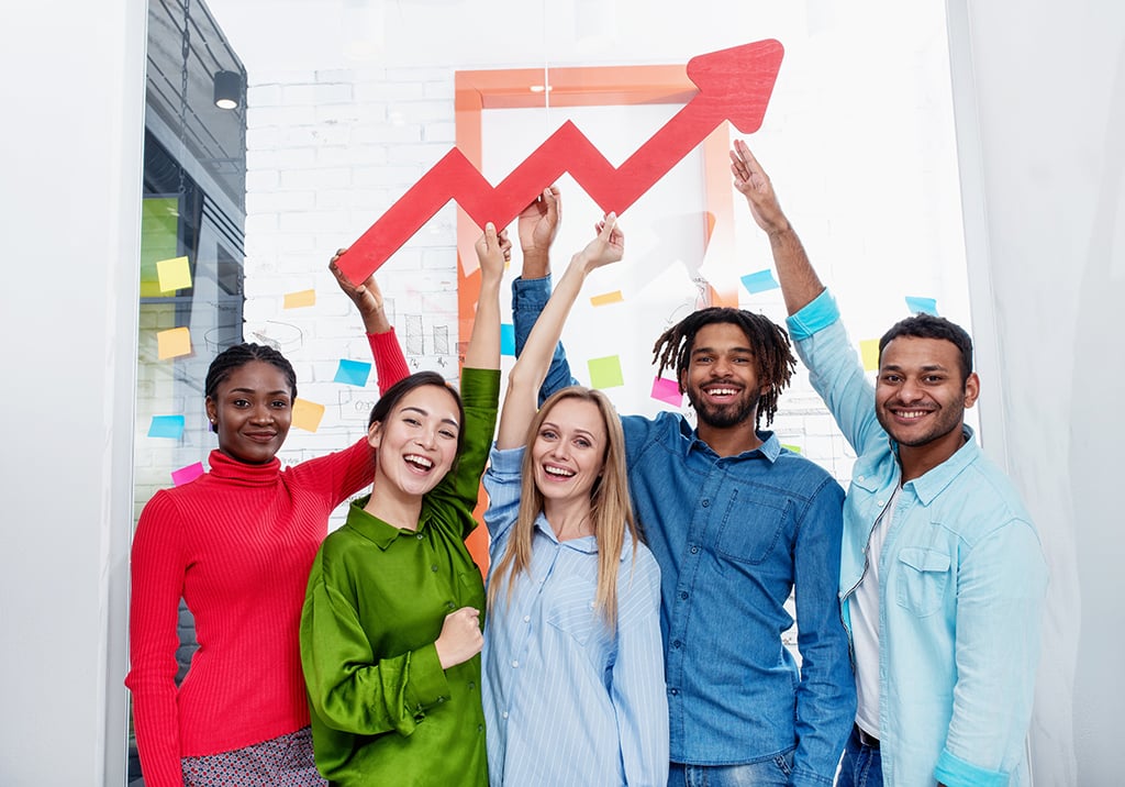 young-happy-colorful-business-team-hold-red-statistical-arrow-concept-growing-succesful