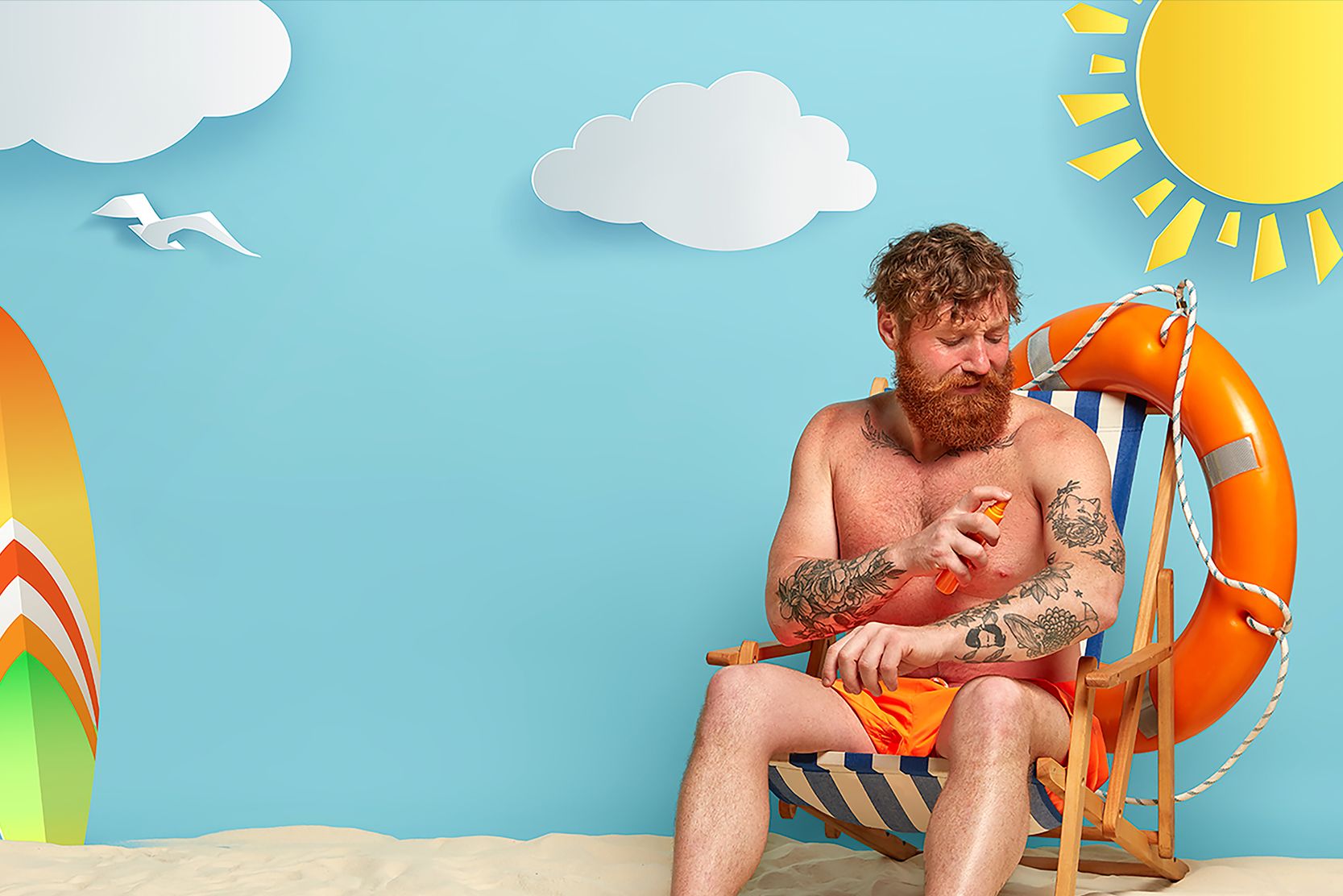 bearded-redhead-posing-beach-with-sunscreen3-2