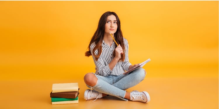 portrait-pensive-young-girl-making-notes_Blog copy