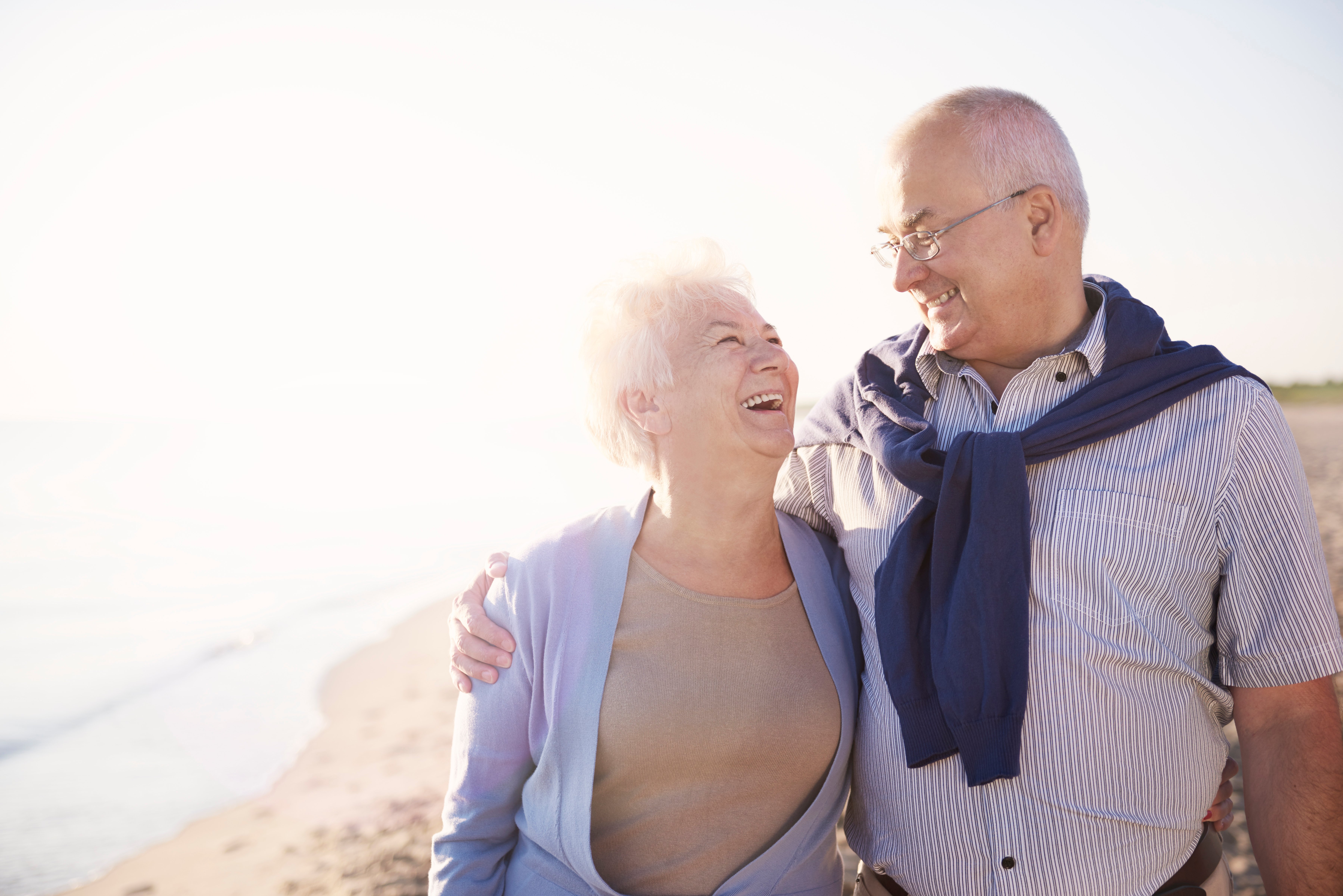 senior-couple-beach-retirement-summer-vacation-concept