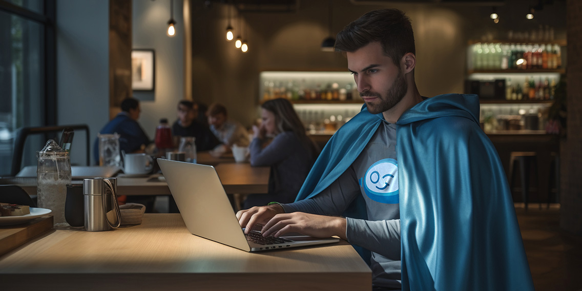 close-up-superhero-working-computer-2