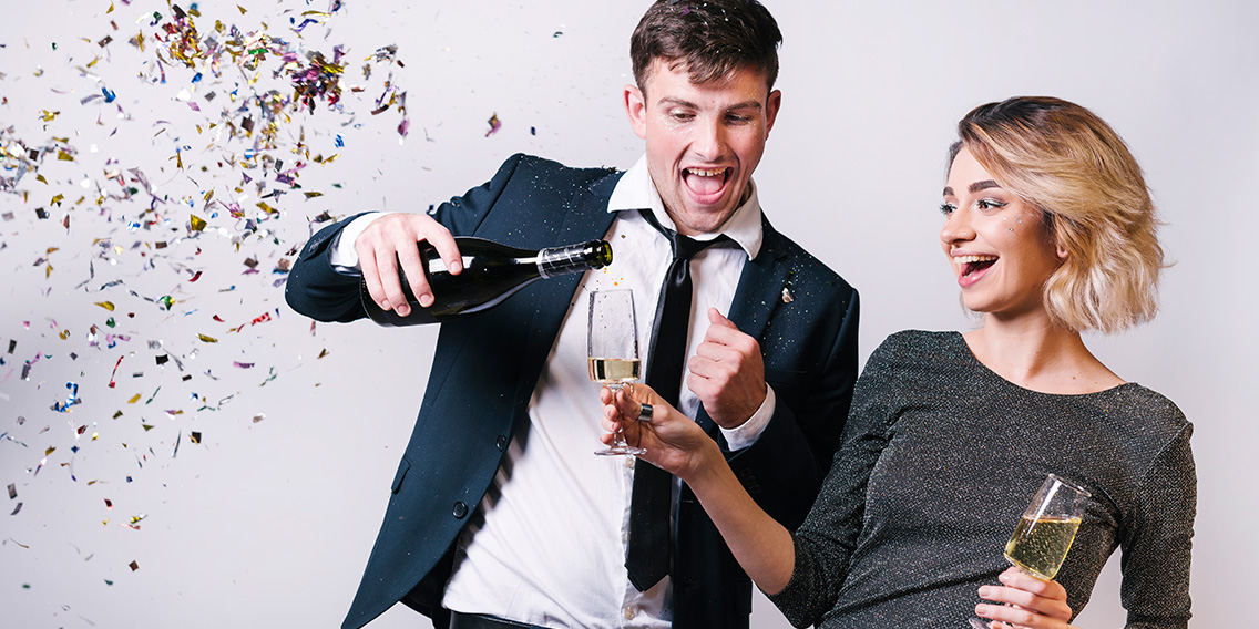 excited-employees-enjoying-champagne