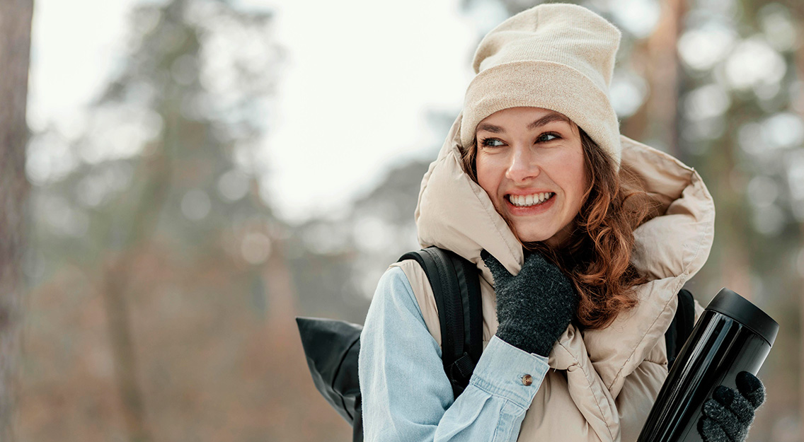 medium-shot-woman-holding-thermos