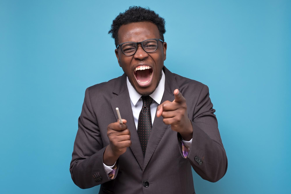 laughing-african-american-man-is-laughing-your-joke-blue-background