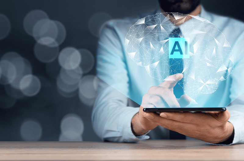 man-holding-digital-tablet-with-ai-icons(2)