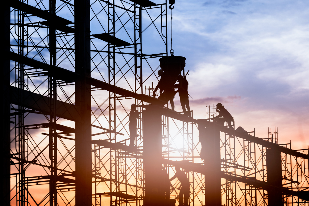 silhouette-worker-construction-building-casting-concrete-work-scaffolding